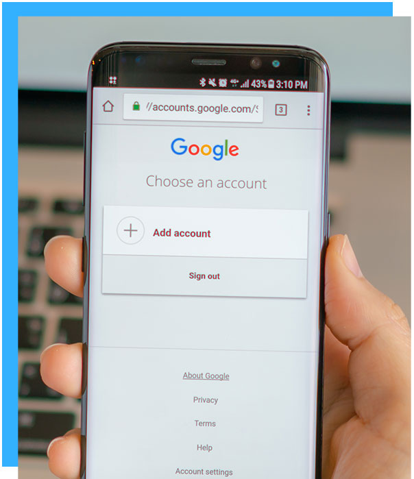 Phone screen showing Google login, emphasizing the importance of advertising on Google - Direct Strategies